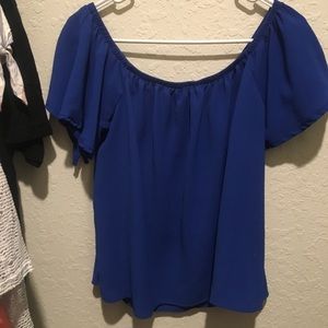 blue off the shoulder shirt